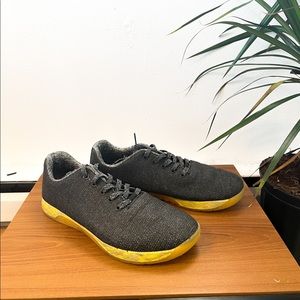 Black and yellow trainers